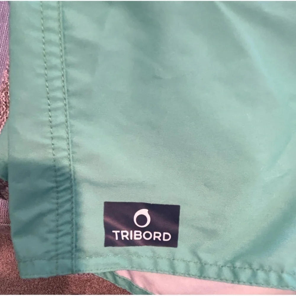 D09.9. Tribord men’s swim trunks color block navy blue/ green Sz 32 W